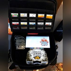 Nintendo DS lite with case, 10 games, guitar hero adapter, charger,stylus